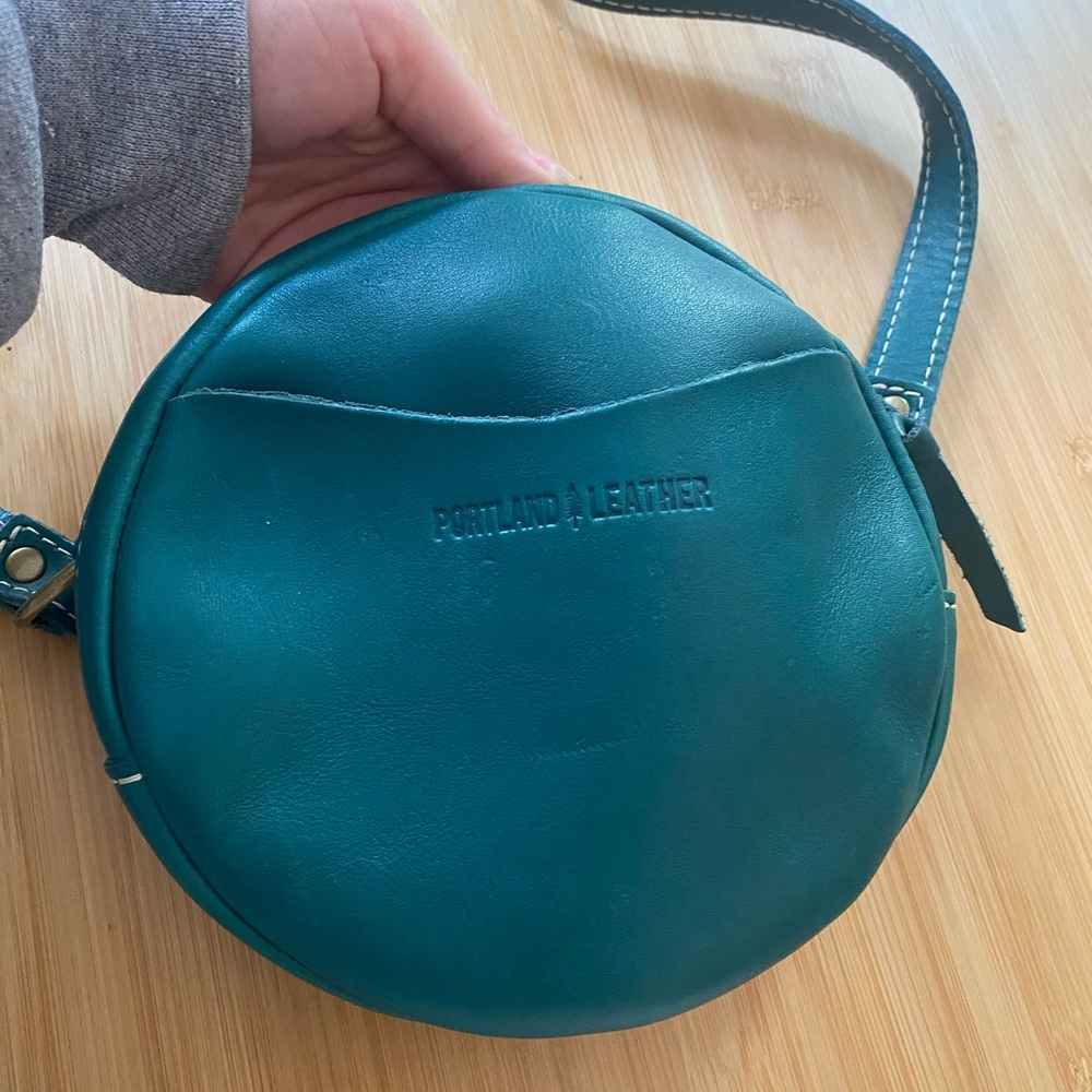 Portland Leather small circle crossbody in peacock
